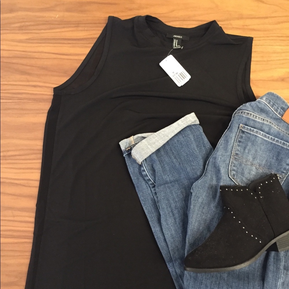 Asymmetrical black top with see through back